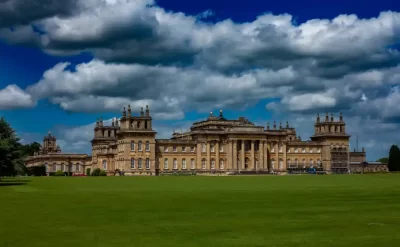 An image of Blenheim Palace in the sunlight. This shows the restoration work that G&M Building Contractors can carry out. The builders have done work on the natural stone works at the palace to restore it.
